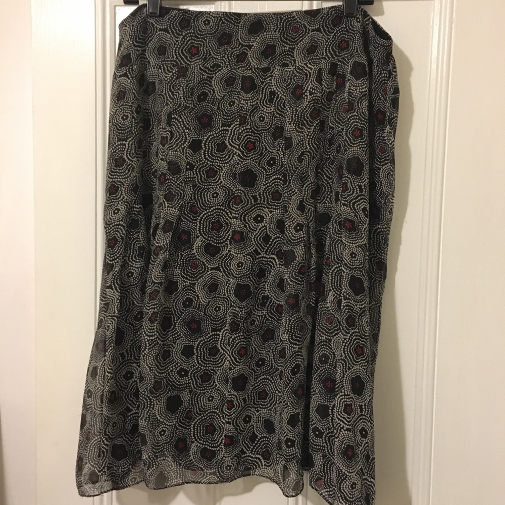 Sheer, flowing skirt.